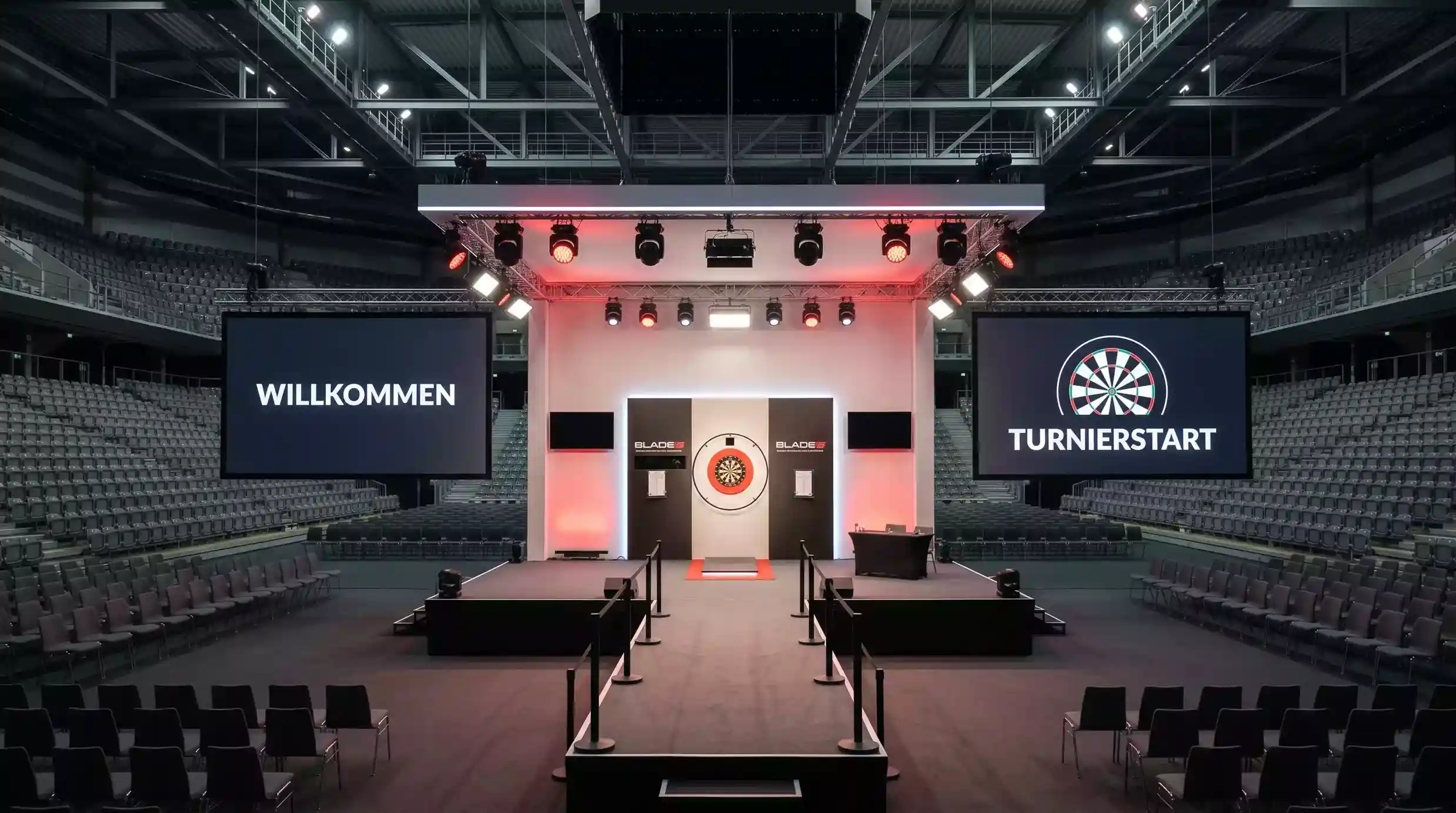 PDC Darts WM Bühne mit Beleuchtung und Spielern am Oche